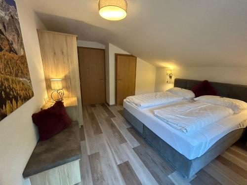 Postel nebo postele na pokoji v ubytování Haus Lusspark