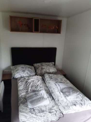 Postel nebo postele na pokoji v ubytování Tinyhouse Wemding