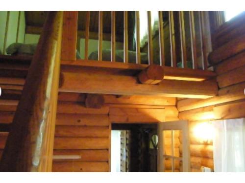 a set of stairs in a log cabin at Karuizawa Sunny Village - Vacation STAY 57957v in Karuizawa