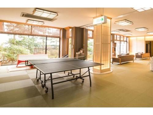 a ping pong table in the middle of a room at Yuzennoyado Toukai - Vacation STAY 57658v in Ureshino