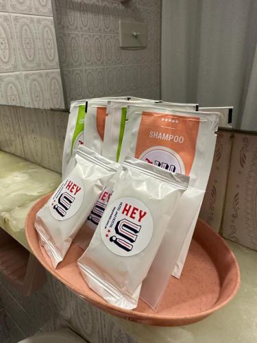 a table with three bags of help chips on it at Hotel Hey U in Santa Fe