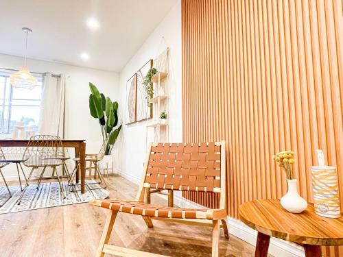 a living room with a bench and a table at Hollywood Habitat - BR11-WH in Los Angeles