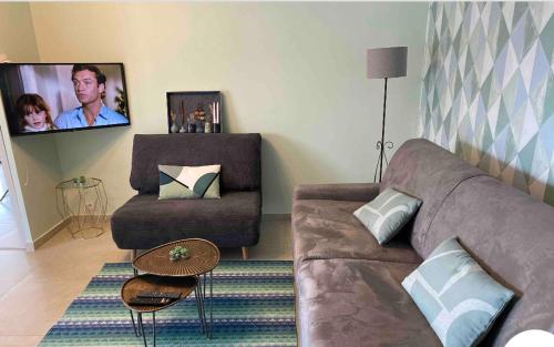 Palmiers plage,vue mer,veranda,balcon,parking,clime