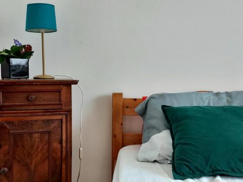 Postel nebo postele na pokoji v ubytování Gîte La Maison Hébergement touristique Jura