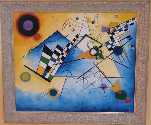 a picture of a painting with kites on the wall at Hotel Plaza Inn in Figueres