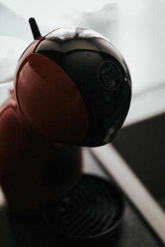 a computer mouse sitting on top of a table at Les Lilas - Confort - Calme - Wifi in Volvic