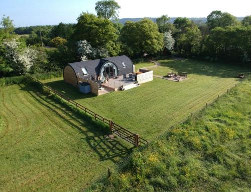 an overhead view of a dome tent in a field at Riding Gate Lodge in Charlton Musgrove