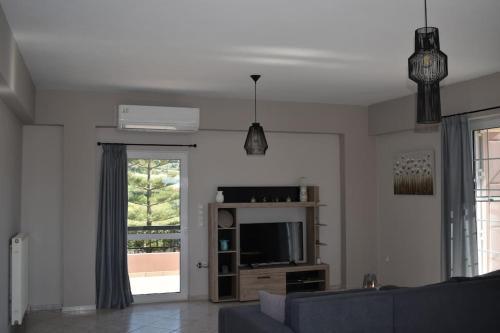 TV a/nebo společenská místnost v ubytování Arion Residence