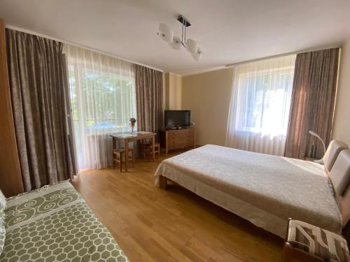 Postel nebo postele na pokoji v ubytování Rest in Palanga