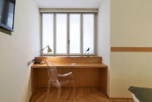 Un televizor și/sau centru de divertisment la Sweett- Maison Laghetto