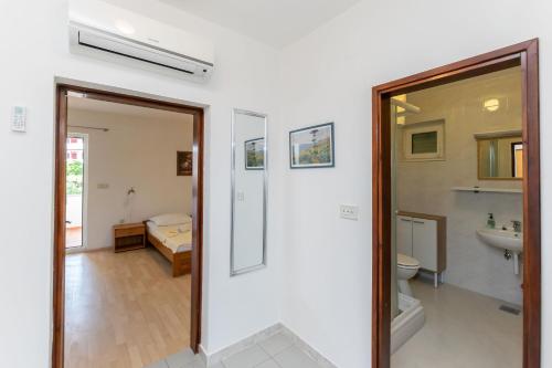 Kúpeľňa v ubytovaní Apartments Ivan M