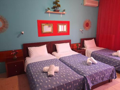 Posteľ alebo postele v izbe v ubytovaní Faros