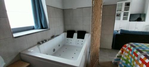 Un pat sau paturi într-o cameră la El Molino 4