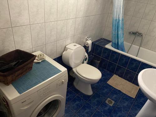 Kylpyhuone majoituspaikassa FIGALIA Apartments