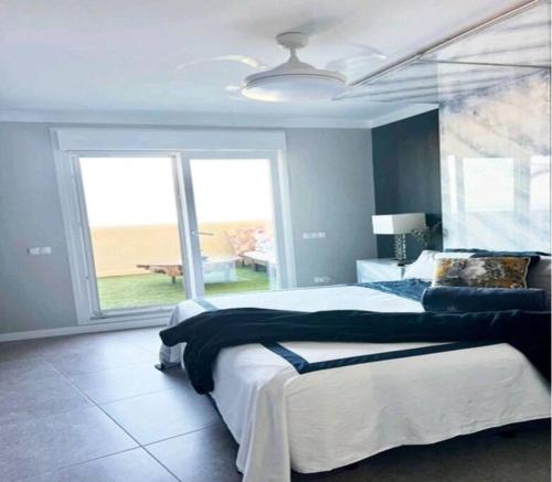 Posteľ alebo postele v izbe v ubytovaní Magnifique Duplex vue mer