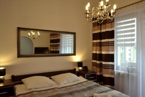 Ένα ή περισσότερα κρεβάτια σε δωμάτιο στο Hotel Piast