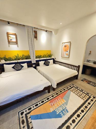 Ένα ή περισσότερα κρεβάτια σε δωμάτιο στο Hacoda Homestay