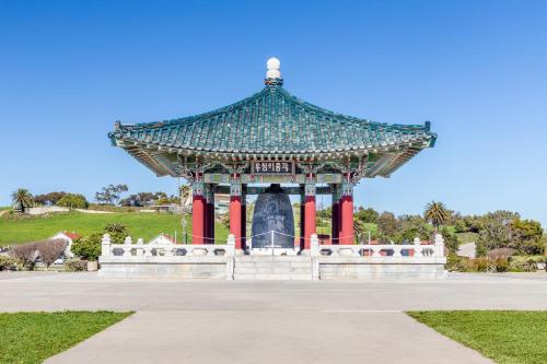 a large pagoda with red columns in a park at Crowne Plaza Hotel Los Angeles Harbor by IHG in San Pedro