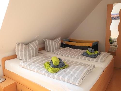 Postel nebo postele na pokoji v ubytování Ferienwohnung Carpe Diem