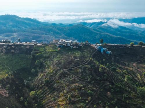 an aerial view of a village in the mountains at CLIFF VERANDAH @ DOI LAN in Ban Huai Khai