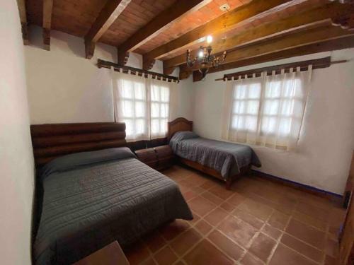 Krevet ili kreveti u jedinici u okviru objekta Casa Inés