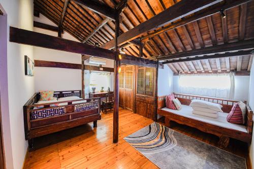 Ένα ή περισσότερα κρεβάτια σε δωμάτιο στο Hui Boutique hotel