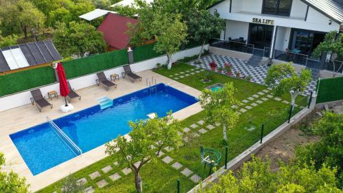 an overhead view of a swimming pool in a yard at Sea Life Homes in Kemer