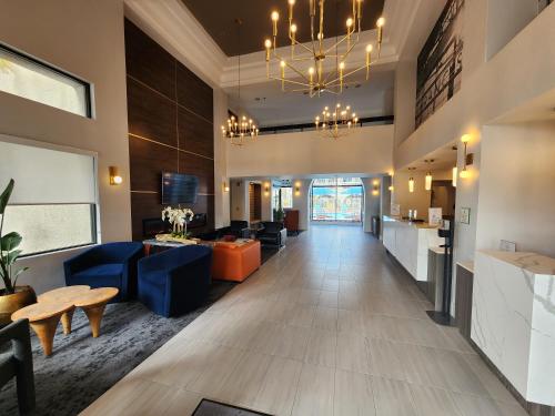 a lobby of a hospital with a waiting room at La Quinta by Wyndham San Francisco Airport West Millbrae FREE AIRPORT SHUTTLE in Millbrae