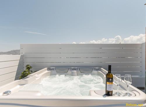 Nápoje v ubytovaní Aphrodite Luxury Apartments