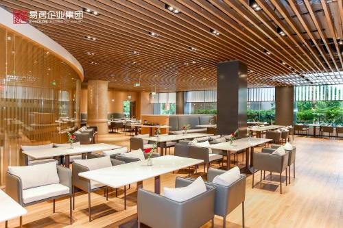 ห้องอาหารหรือที่รับประทานอาหารของ Ewo Grand Hotel Shanghai