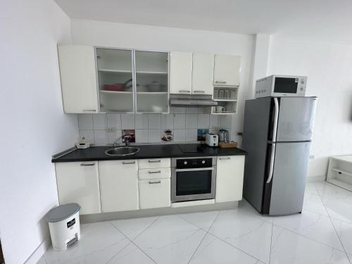 Η κουζίνα ή μικρή κουζίνα στο Condo Express View Talay 6