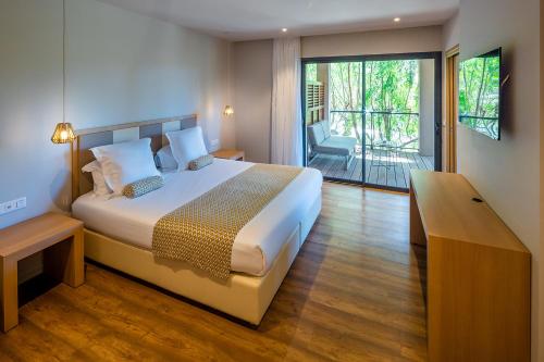 Postel nebo postele na pokoji v ubytování Hotel Restaurant Mariosa