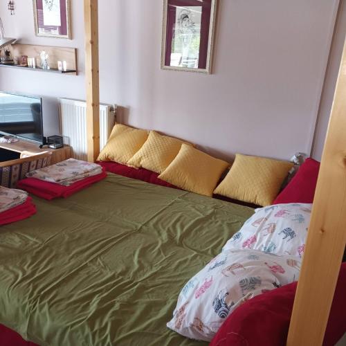 Postel nebo postele na pokoji v ubytování Apartmani sa pogledom na Dunav - Akademik