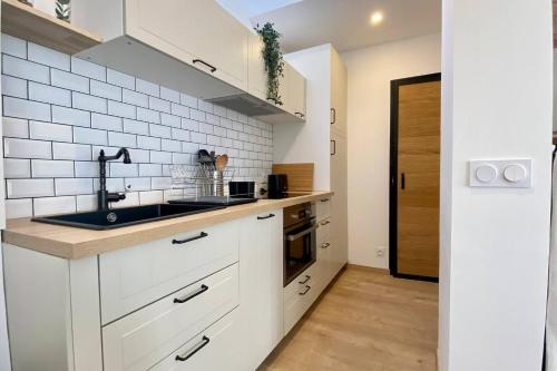 Una cocina o zona de cocina en Plain-pied pour 4 au cœur du Crotoy