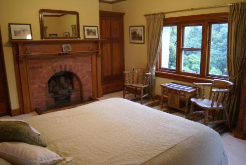 Letto o letti in una camera di Gunyah Country Estate