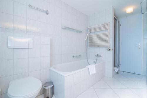 Koupelna v ubytování Camana Wohnung EG