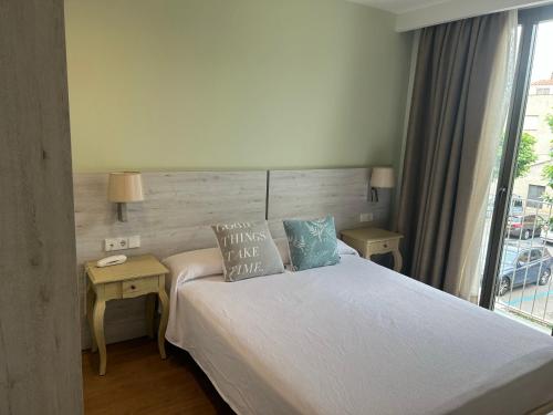 Letto o letti in una camera di Hotel L'Escala Centre