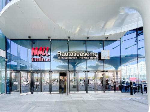 a view of the front of a building at Trendy Nordic Studio by Tram Stop in Helsinki