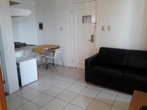 Η κουζίνα ή μικρή κουζίνα στο JG Silva Hospedagem AMERICAN FLAT BEIRA MAR