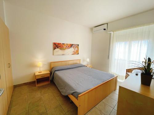 A bed or beds in a room at IL GABBIANO