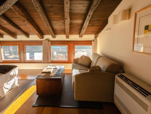 a living room with a couch and a table at Hotel Torre Zumeltzegi in Oñate