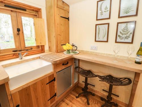 a kitchen with a sink and a counter at Bracken Fern in Richmond