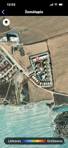 a map of a parking lot with a red circle at Seaview apartment with roof terrace in Kalecik