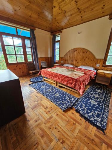 Una cama o camas en una habitación de Orchards House - The Hidden Tribe