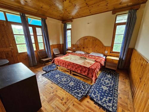 Una cama o camas en una habitación de Orchards House - The Hidden Tribe