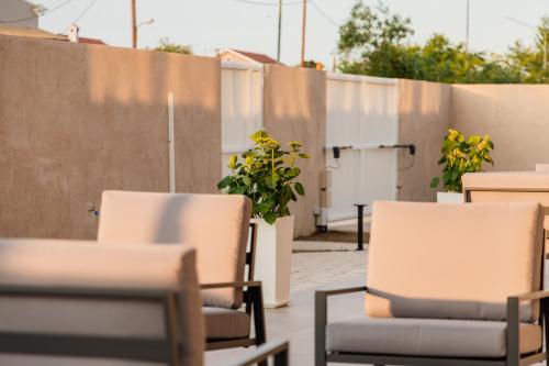 Χώρος καθιστικού στο Melena Premium Suites