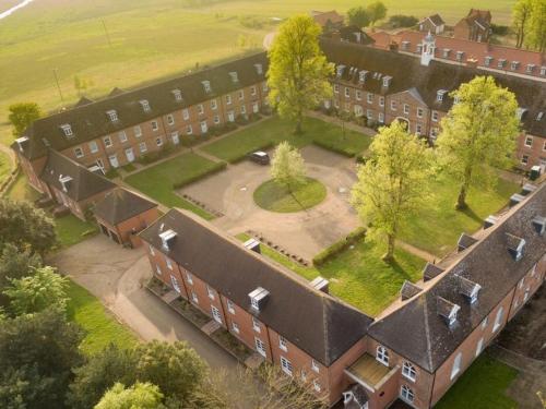 an aerial view of a building with a courtyard at The Gallery, Blythburgh in Blythburgh