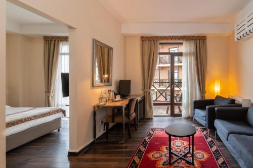 Postel nebo postele na pokoji v ubytování GINGER Hotel