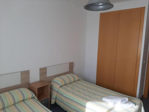 Postel nebo postele na pokoji v ubytování Mar de Oropesa II