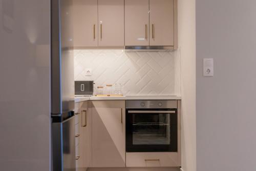 Η κουζίνα ή μικρή κουζίνα στο Melena Premium Suites